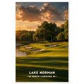 Golf fairway and green with bunkers beside a lake and tall trees at sunset on Lake Norman, North Carolina