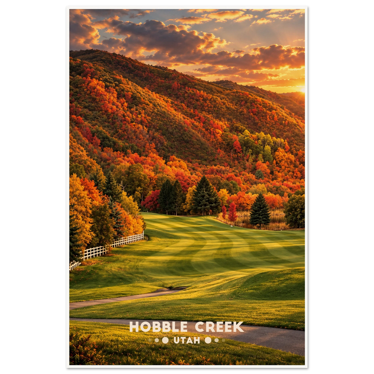 Striped golf fairway with white fence below autumn hillside at sunset in Hobble Creek, Utah